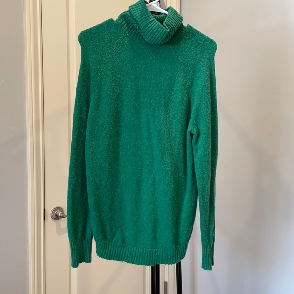 Green turtleneck sweater
